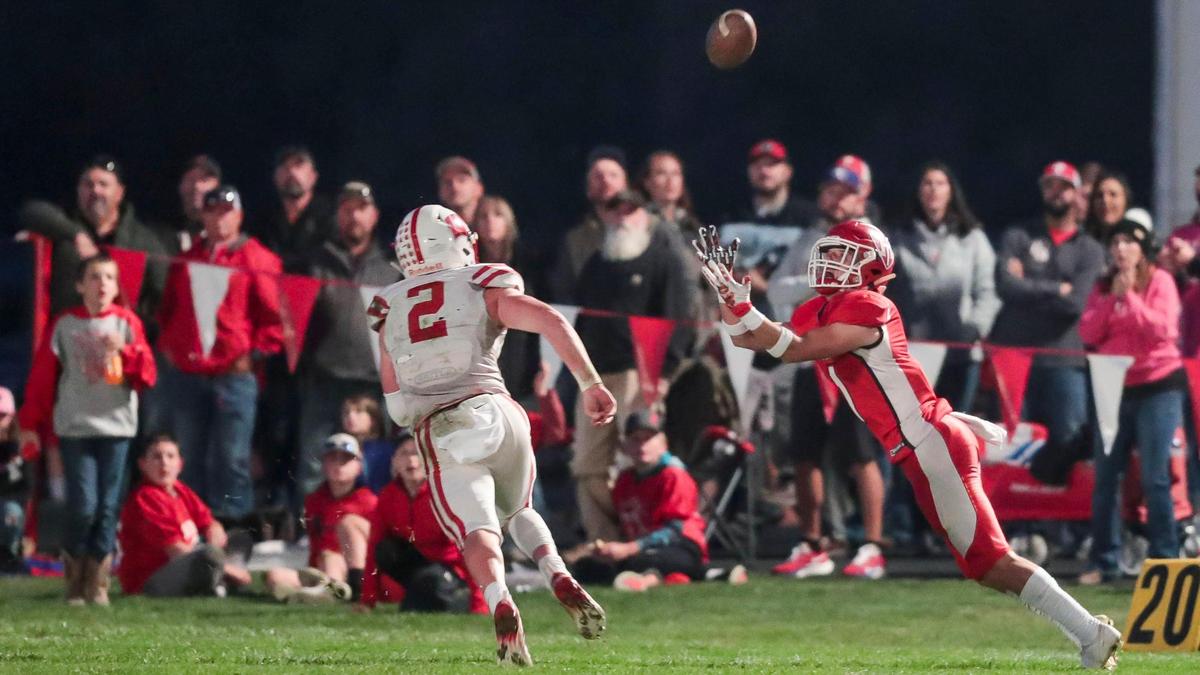 Homedale wide receiver Josh Brown hauls in a pass along the sideline against Weiser on Oct. 15. The Trojans (10-0) hosts Sugar-Salem (7-2) in the 3A semifinals at 1 p.m. Saturday.
