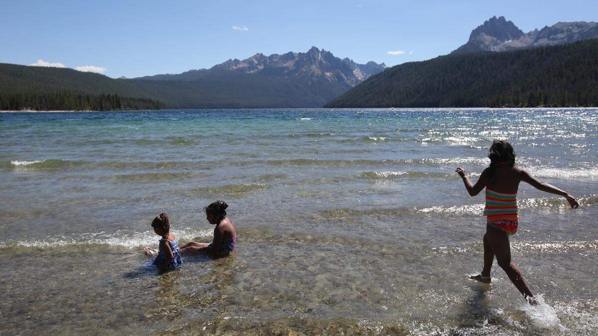 Redfish Lake at the base of the Sawtooth Mountains is a picturesque spot for camping, hiking, fishing — or just cooling off.