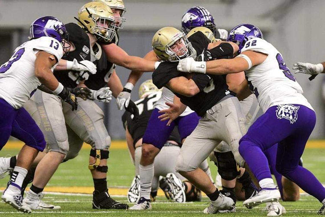 Running back Nick Romano, center, has helped Idaho average 177 yards per game on the ground, which ranks fourth in the Big Sky Conference.