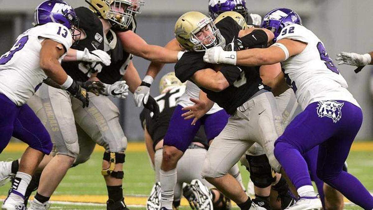 Running back Nick Romano, center, has helped Idaho average 177 yards per game on the ground, which ranks fourth in the Big Sky Conference.