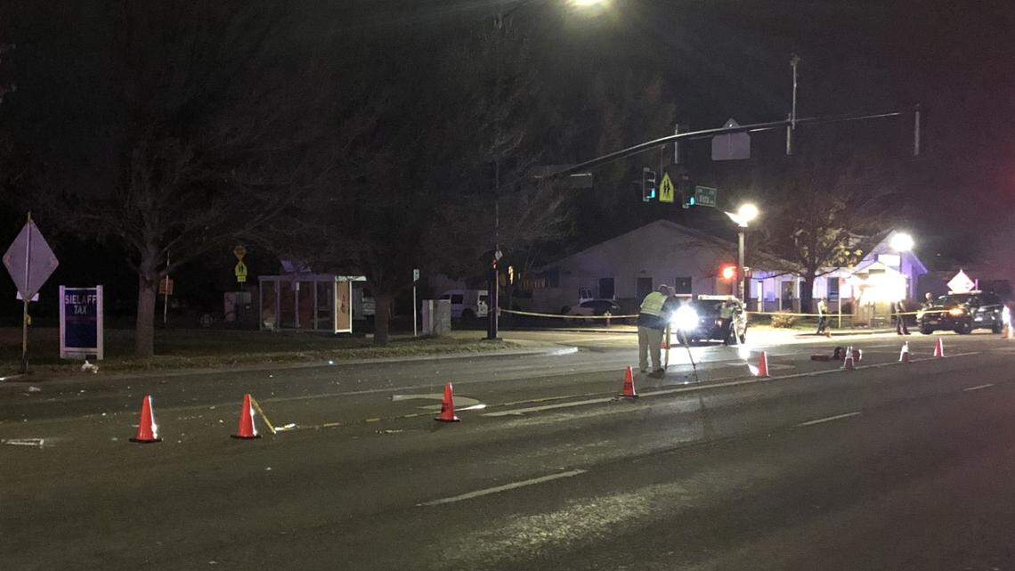 Crash reconstructionists take measurements at the scene of where a car struck and killed a pedestrian Wednesday night, Oct. 24, 2018. This view is from the north side of Targee Street at the intersection with Vista Avenue in Boise.