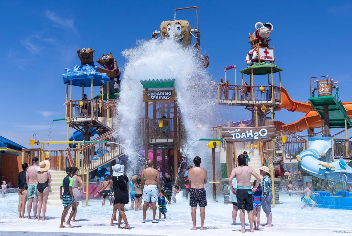 A potato-shaped bucket called Tippin’ Tater dumps water on patrons at Roaring Springs Waterpark in Meridian in 2024. The Idaho-themed attraction was part of the park’s first phase of expansion.