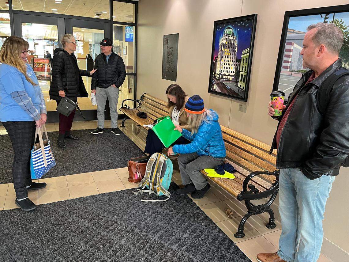 Members of the Boise Parks Association assemble a final batch of signatures on a petition to require that changes to Boise parks go before voters for approval.