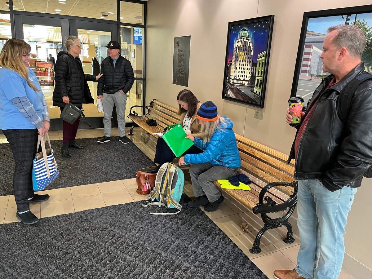 Members of the Boise Parks Association assemble a final batch of signatures on a petition to require that changes to Boise parks go before voters for approval.