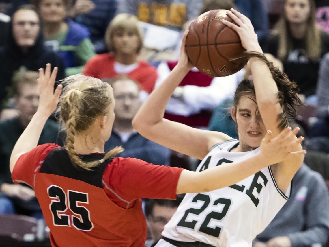 Eagle junior Betsey King looks to pass with full court pressure from Boise’s Syd Davis in the state 5A girls basketball semifinals Friday, Feb. 15, 2019 at Ford Idaho Center in Nampa.