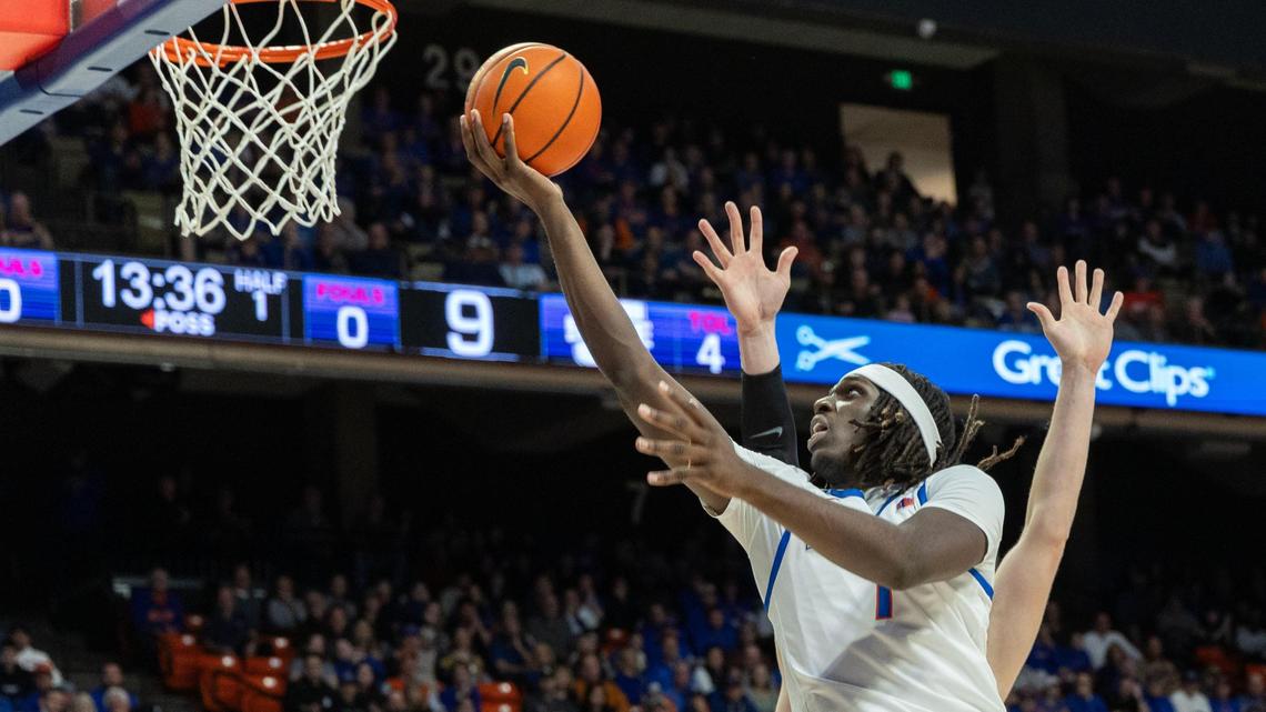 Boise State forward O’Mar Stanley scores against Utah State in the first half at ExtraMile Arena in Boise, Wednesday, Feb. 26, 2025.