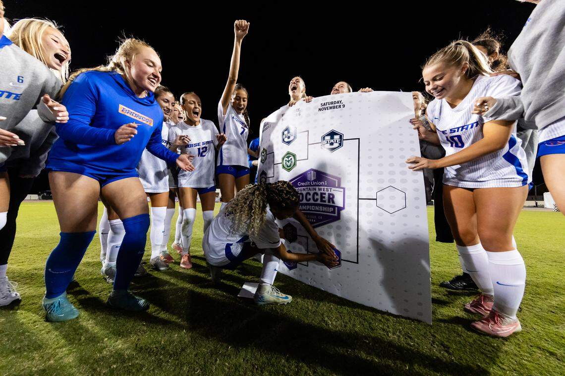 Sophomore forward Asia Lawyer moves the Boise State logo into the championship game on the Mountain West Tournament bracket. The Broncos defeated San Diego State 3-2 in the semifinals Wednesday night in San Diego.