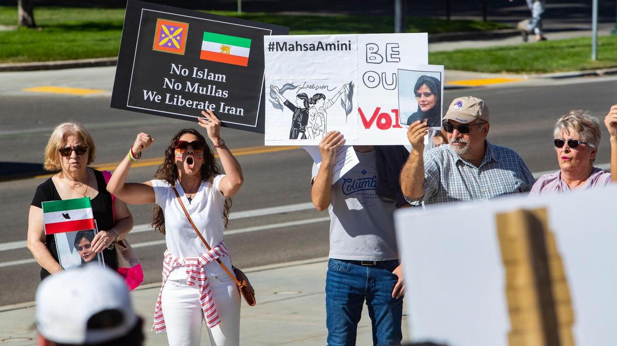 Faraoush Davis, 45, of Boise, second from left, leads a chant during a rally at the Idaho Capitol against the treatment of women in the Middle Eastern nation, on Saturday, Oct. 1, 2022. Protesters have been demonstrating against Iran’s authoritarian government after the death of Mahsa Amini, a 22-year-old woman who last month was taken into police custody for allegedly disobeying the nation’s dress code for women.