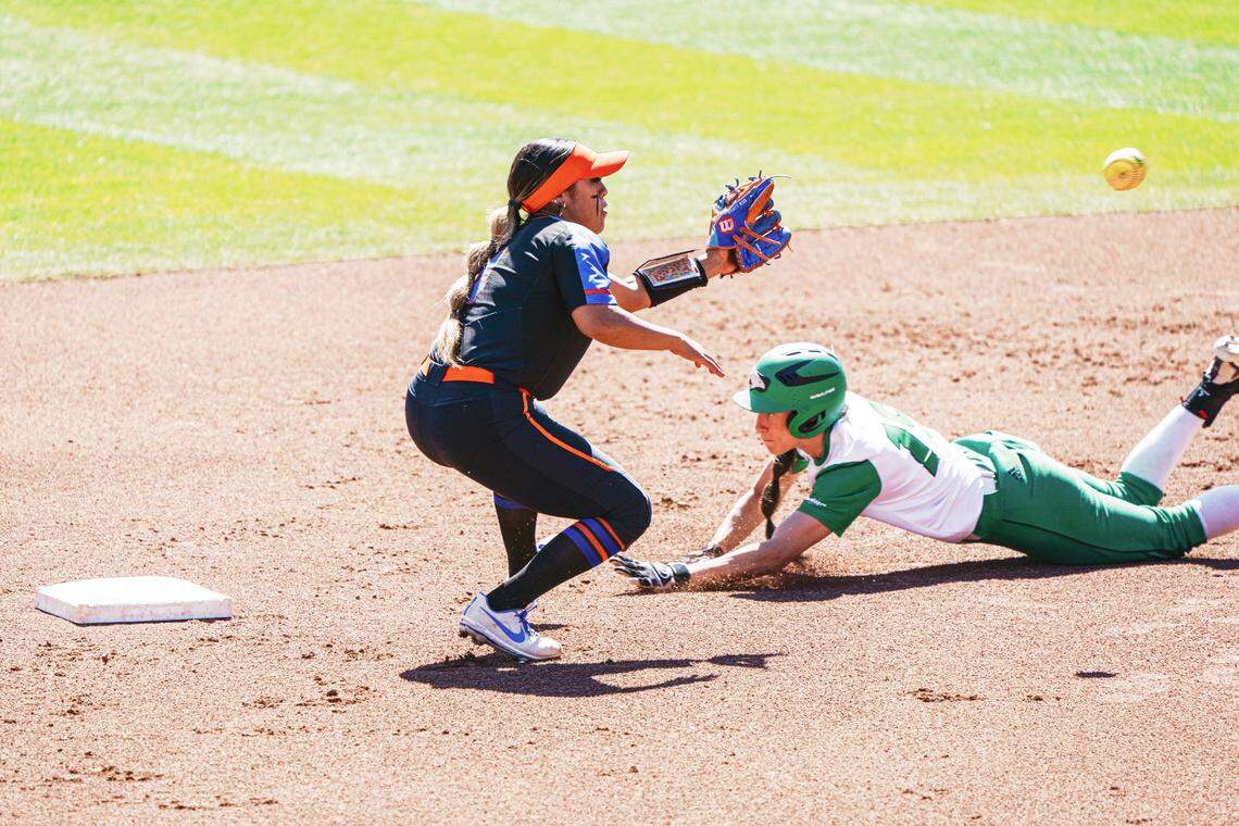 Boise State redshirt senior shortstop Eliyah Flores, left, is on pace to break the school record at her position with a fielding percentage of .956.