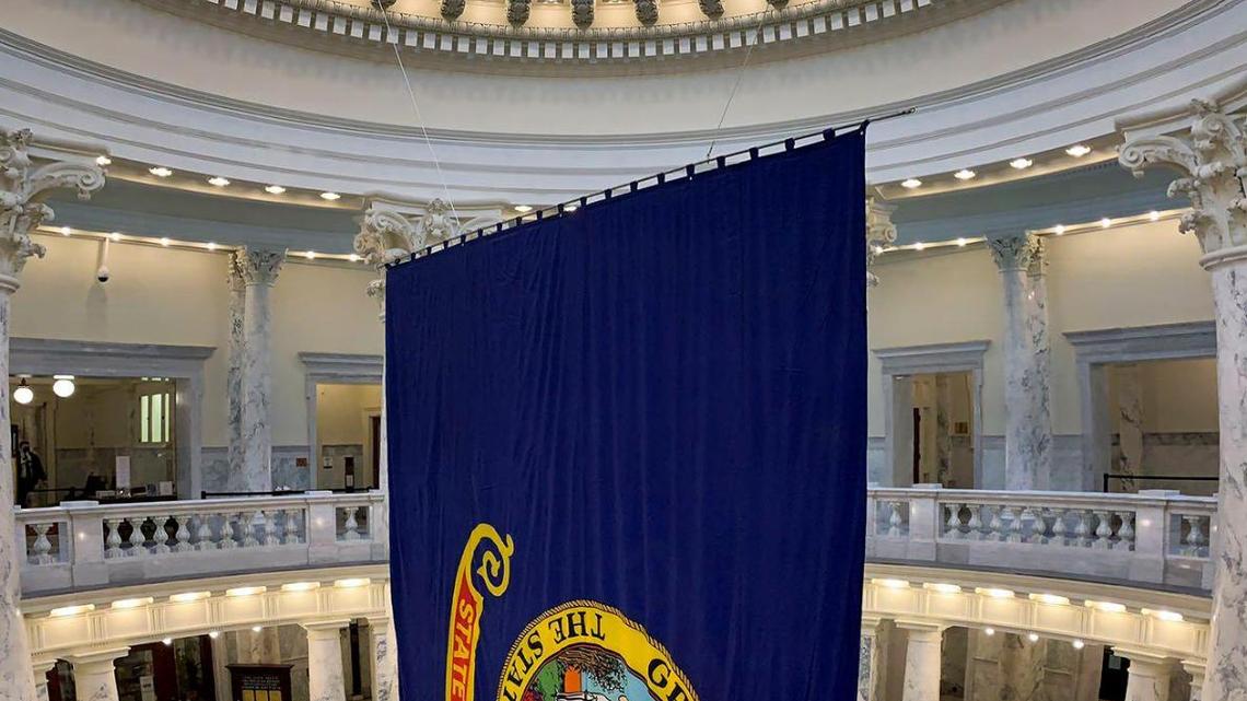 Idaho’s state flag hangs in the Statehouse rotunda Jan. 29, 2021, in Boise.