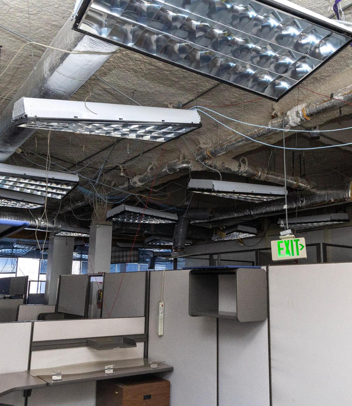 Removing ceiling tiles revealed the presence of asbestos and mold at the Idaho Transportation Department’s campus on State Street in Boise. The building was damaged in a flood in 2022.