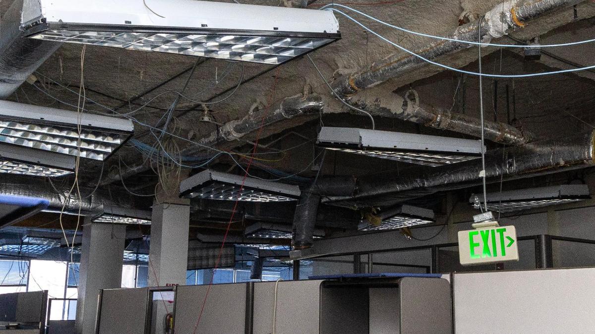 Removing ceiling tiles revealed the presence of asbestos and mold at the Idaho Transportation Department’s campus on State Street in Boise. The building was damaged in a flood in 2022.