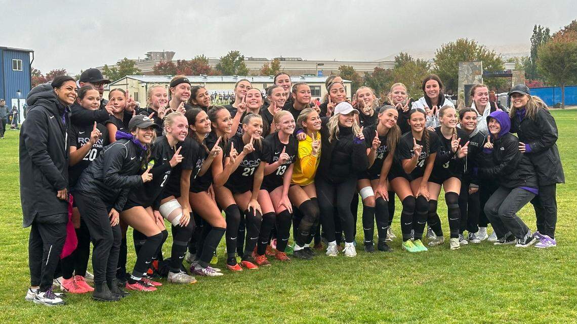 The Rocky Mountain girls soccer team poses for a photo after beating Bishop Kelly 2-1 in the 6A District Three Tournament championship game Wednesday at Timberline High.
