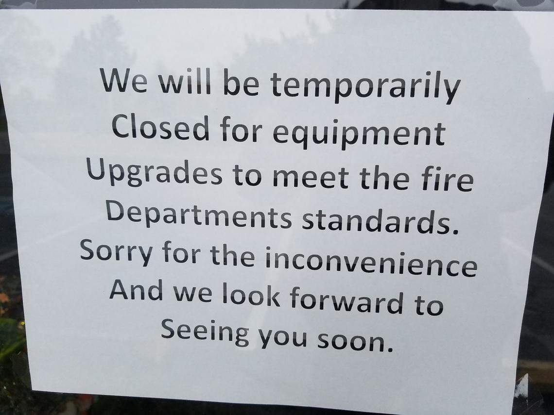 A sign indicating temporary closure has been on the door for months at Pho Bac.