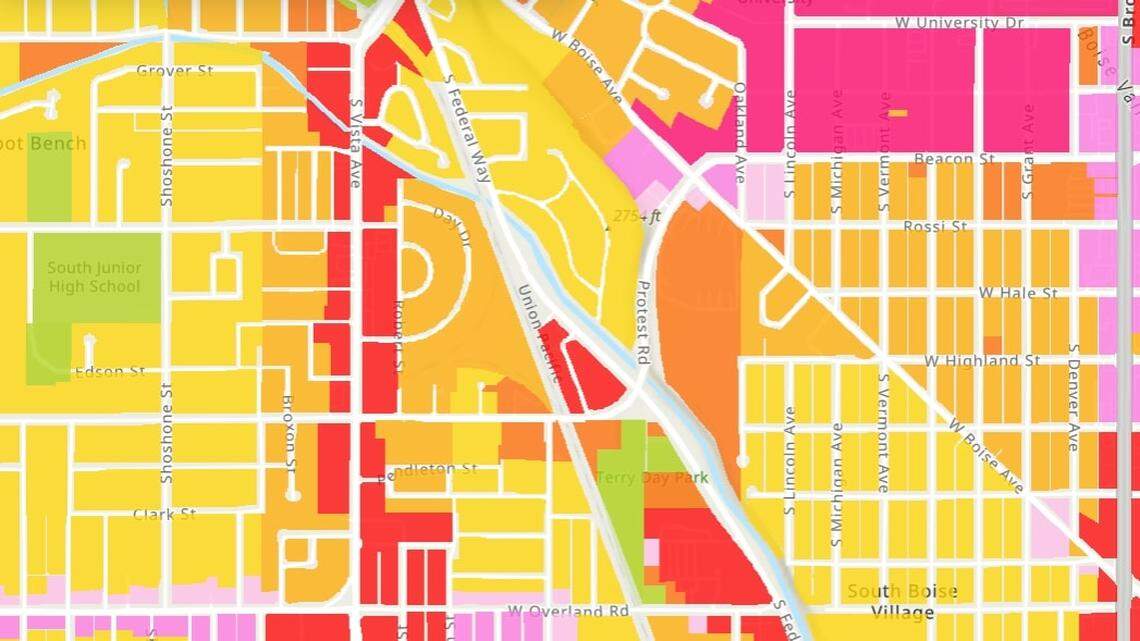 Hawkins would build the apartments in the center of this zoning map, shown in red. That zoning, MX-3, allows developers to build up to 70 feet tall, but neighbors say the parcel was zoned incorrectly as it is surrounded on all sides by residential, shown in yellow and orange. The red strip on the left is Vista Avenue and magenta in top right is Boise State University.
