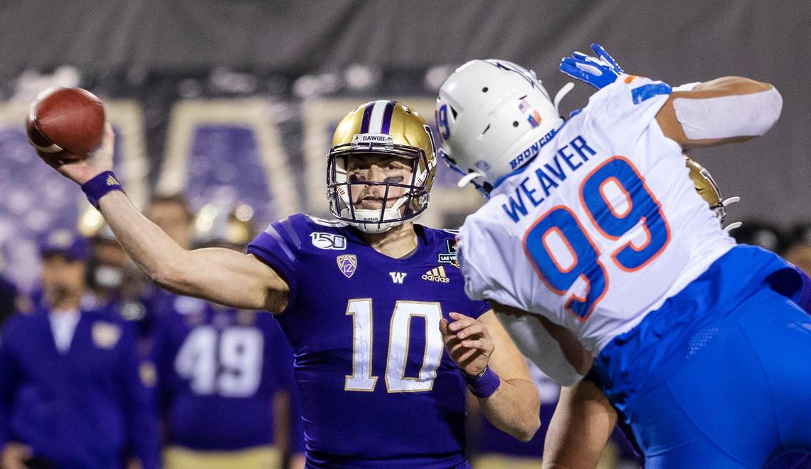 Boise State’s Curtis Weaver pressures Washington quarterback Jacob Eason on Saturday in the Las Vegas Bowl.