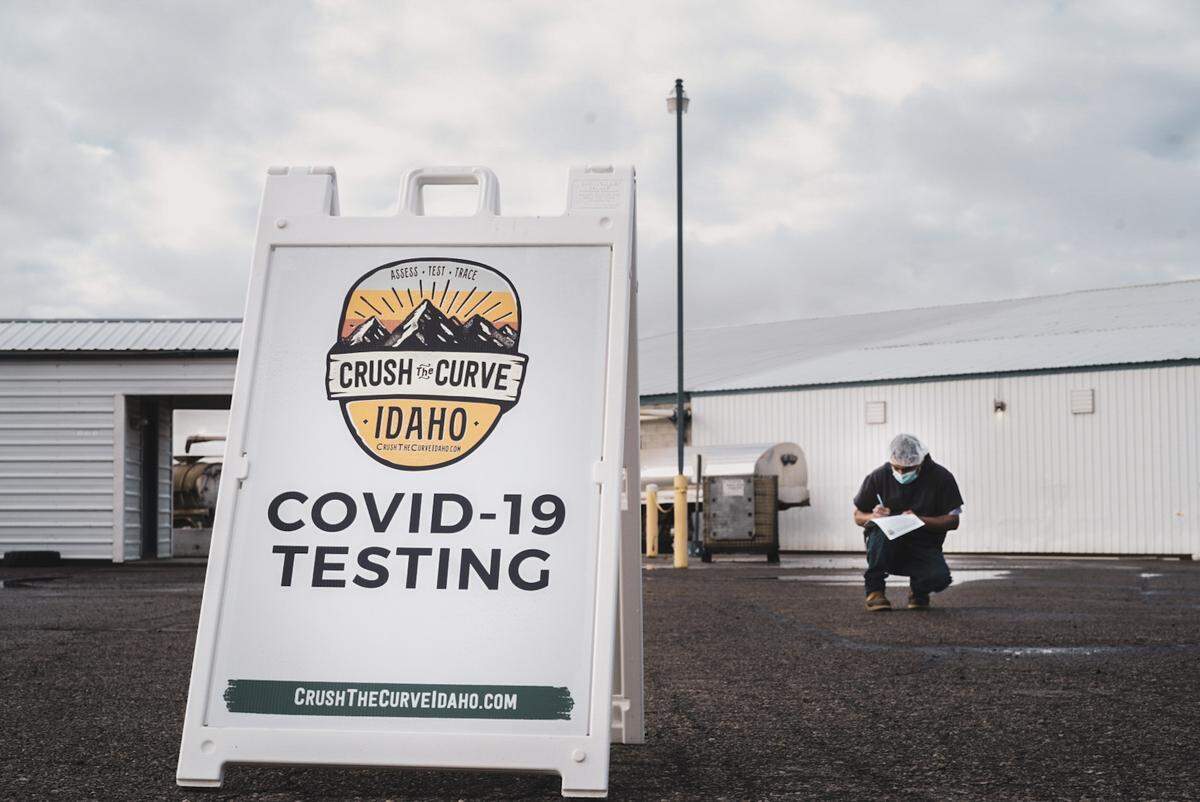 A Fry Foods employee fills out paperwork for Crush The Curve testing at the Weiser processing plant.