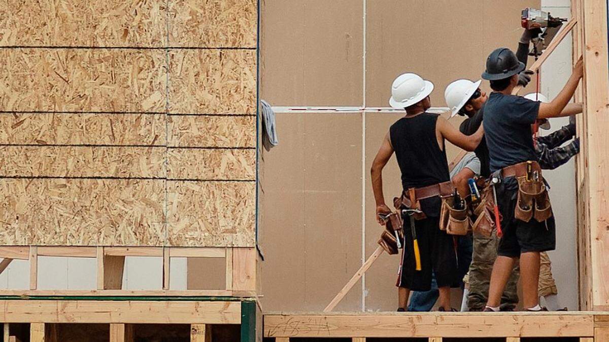 Construction workers frame a Treasure Valley, Idaho, house.