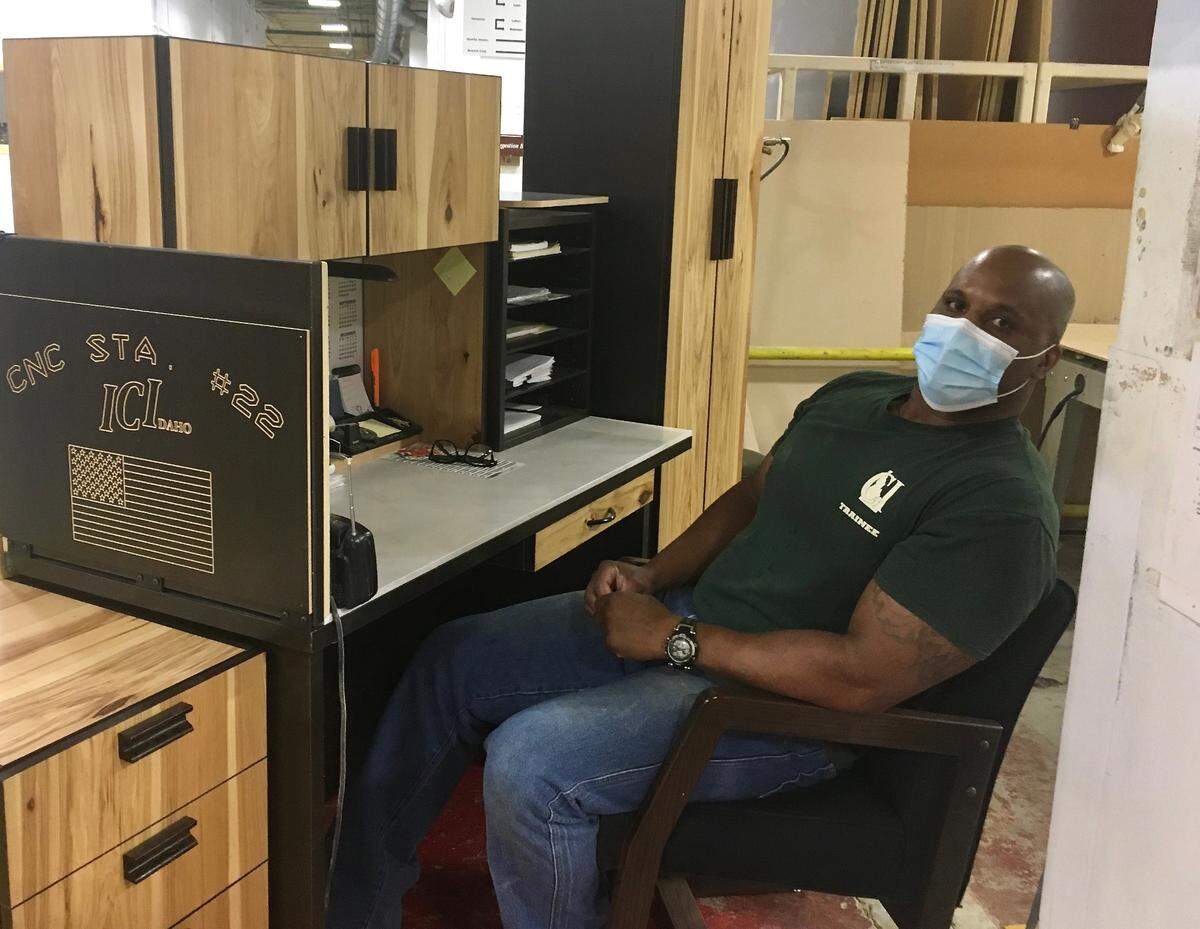 Philip Walker, who has completed more than 10,000 hours’ worth of apprenticeships, at a CNC station. The acronym is for computer numerical control and refers to a range of programmable manufacturing devices that work with a variety of materials, including plastic, metal and wood.