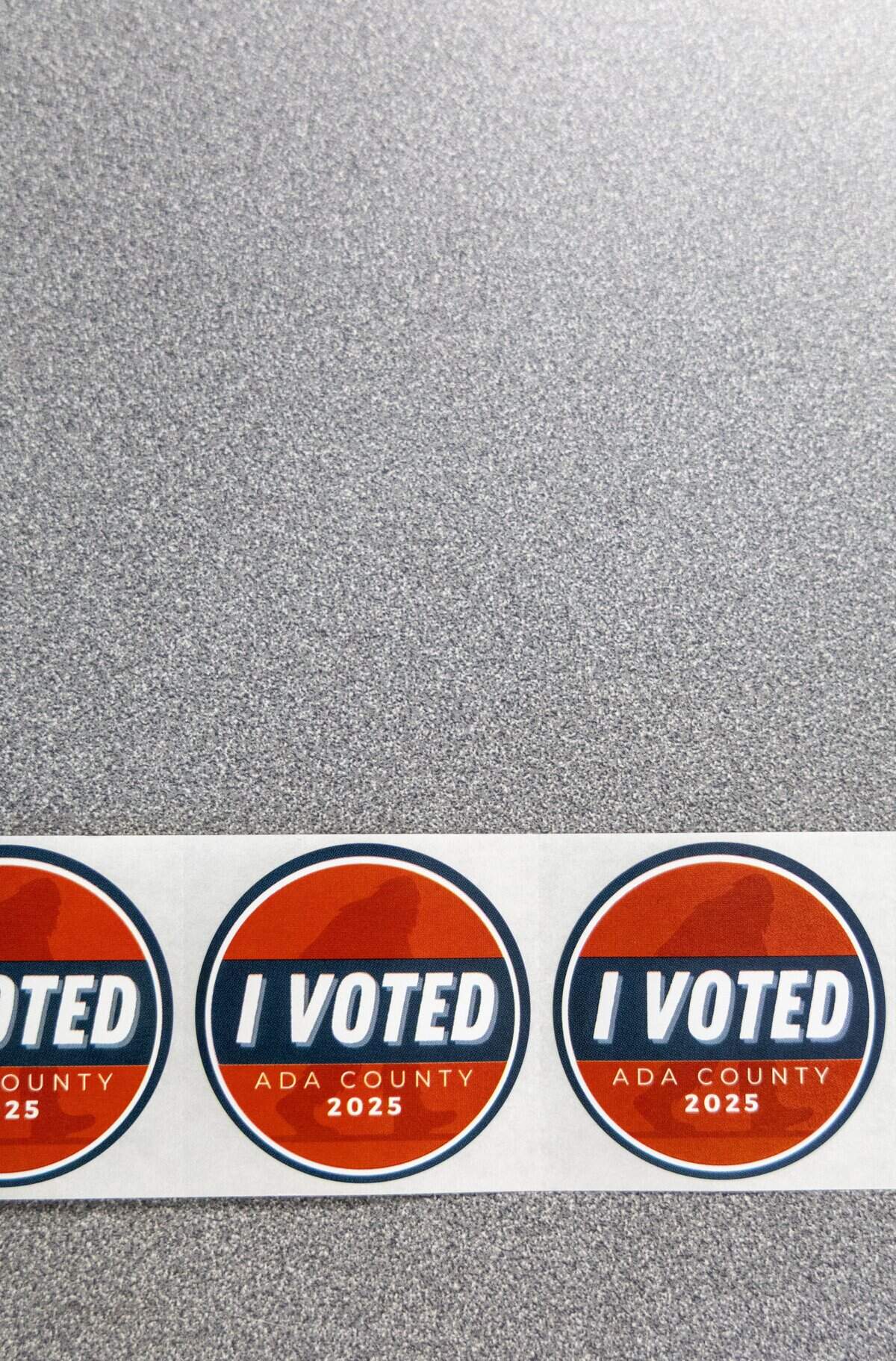 Stickers await voters at the polling site at the West Ada School District office in Meridian, Tuesday, Nov. 4, 2025.