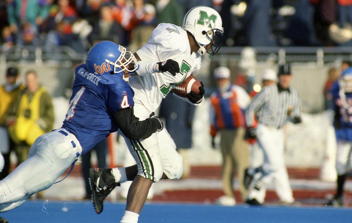 Boise State’s Keith Walk-Green, left, had three passes defended, including one on Marshall’s final play of the game, to help the Broncos rally for a 28-24 victory over Marshall in the 1994 I-AA national semifinals.
