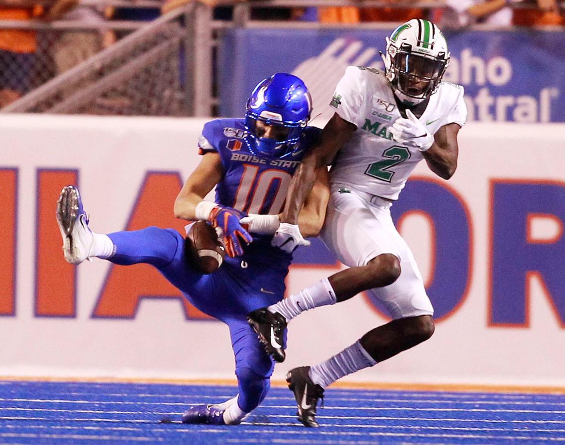Safety Kekoa Nawahine grabs his fourth career interception as Boise State defeated Marshall 14-7 on Friday at Albertsons Stadium.