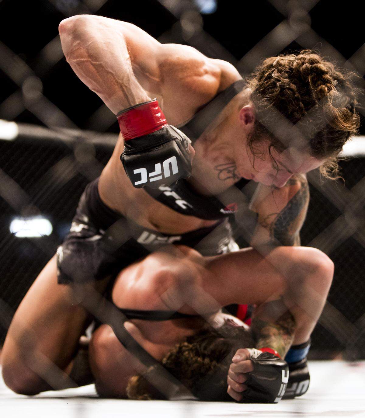 Liz Carmouche defeats Jennifer Maia by unanimous decision in a women’s flyweight bout at UFC Fight Night 133 on Saturday at CenturyLink Arena in Boise.