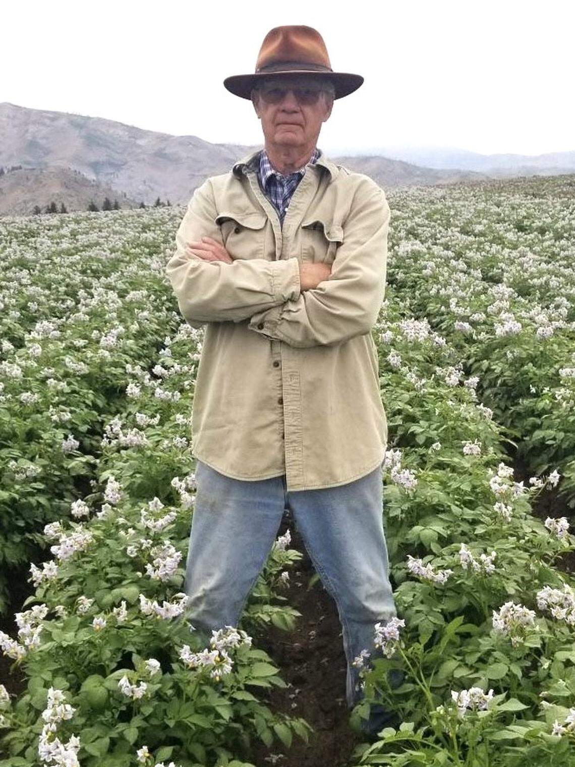 Don McFarland, the owner of Genesis Organics, stands in a field of crops at his 4,000 acre property overlooking the Anderson Ranch Reservoir, about 30 minutes northwest of Mountain Home. In December, McFarland placed his farm for sale for $27 million.
