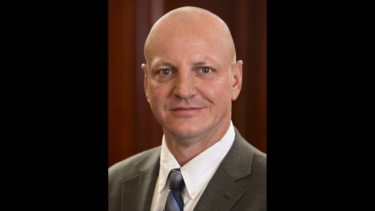 ESI CEO Tom Hill.