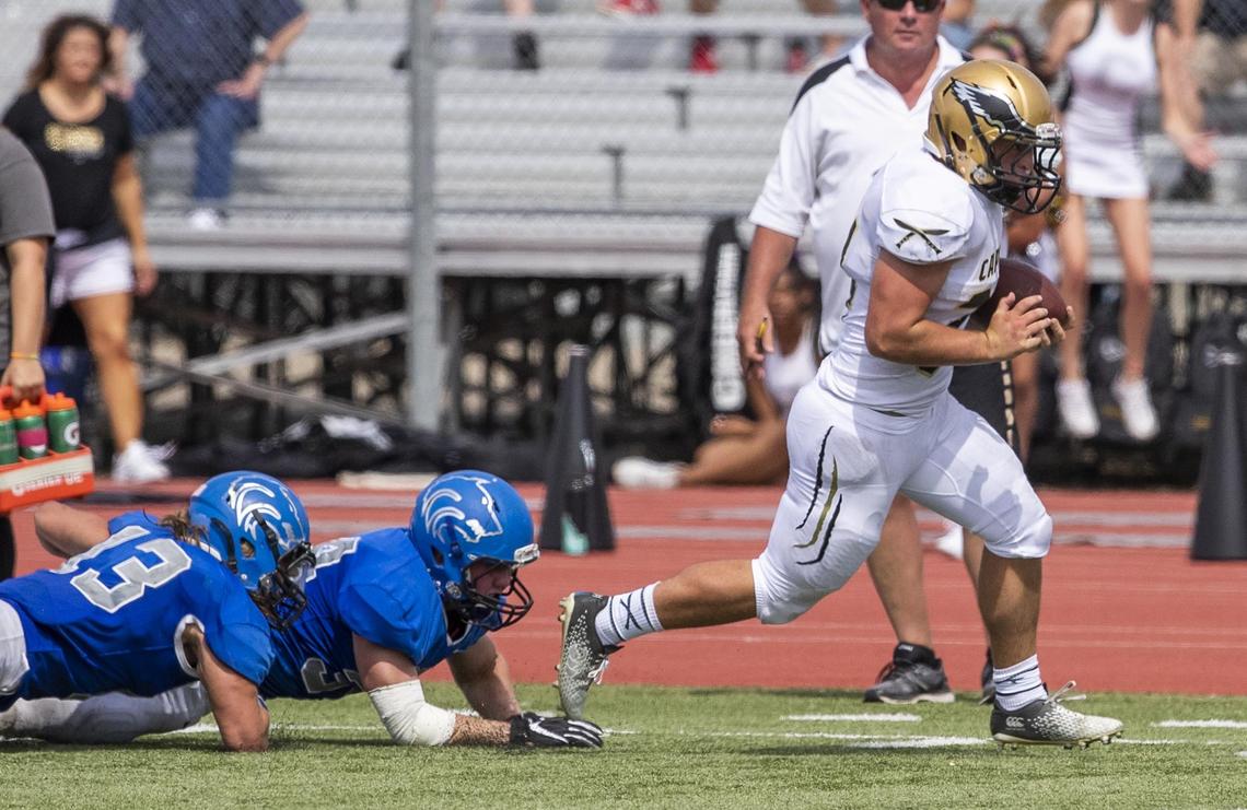 Capital running back Sean Holstein breaks through Timberline’s defense and doesn’t look back before scoring the game-winning touchdown Saturday, Sept. 7, 2019 at Dona Larsen Park in Boise.