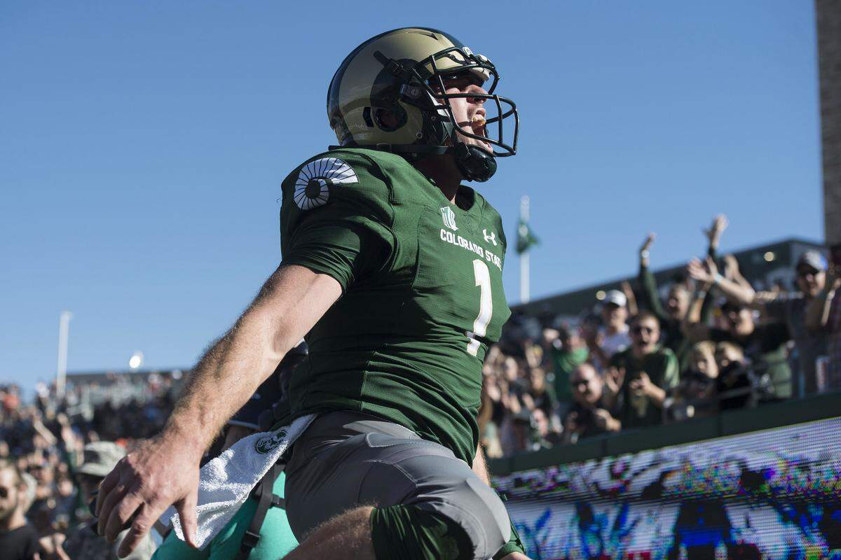 Colorado State University senior quarterback K.J. Carta-Samuels celebrates after running for a touchdown against New Mexico last Saturday at Canvas Stadium in Fort Collins, Colo.