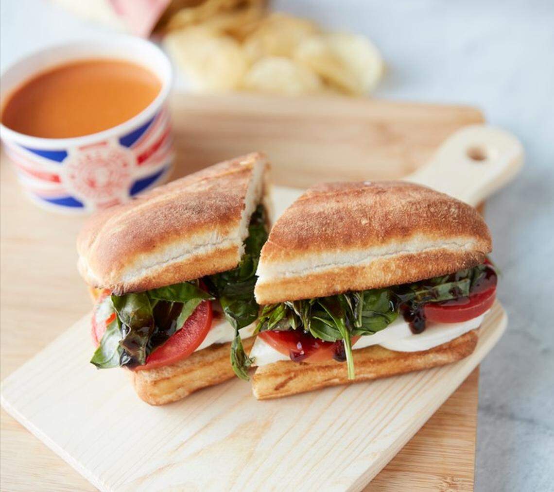 The Caprese (fresh mozzarella, Roma tomato, basil, balsamic vinegar) is one of the menu options.