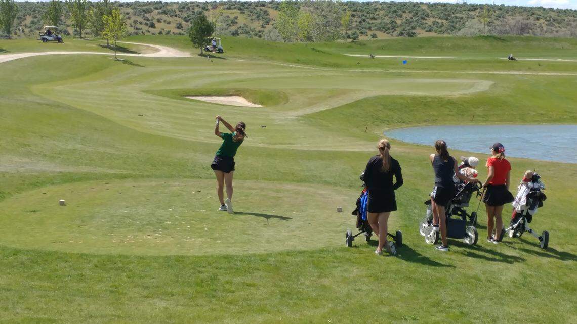 Eagle’s Elle McCord won the 5A District Three title last week, above. She sits one shot off the leader after the first round of the 5A state tournament in Pocatello.