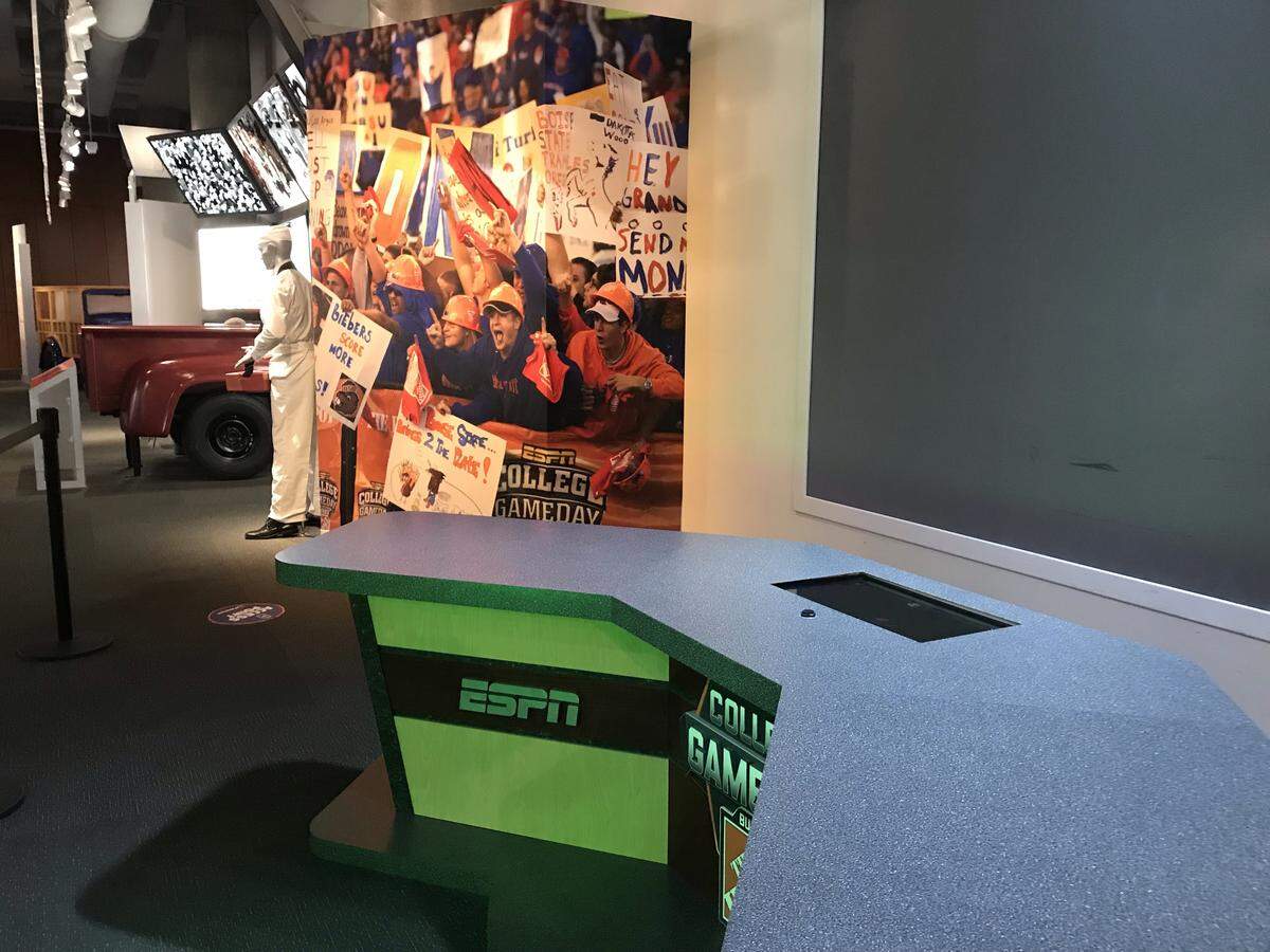 Boise State fans are featured as part of the “College GameDay” exhibit at the College Football Hall of Fame in Atlanta.