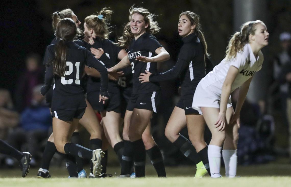Bishop Kelly celebrates the lone goal in their 4A District Three girls soccer championship game against Kuna on Thursday.