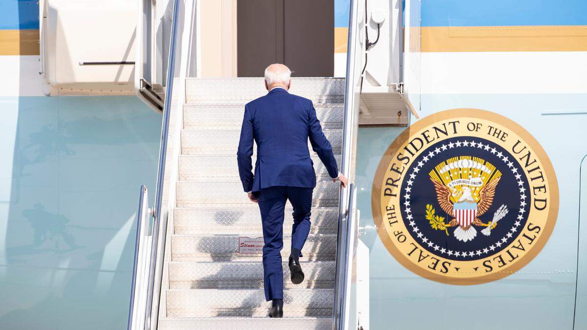 President Joe Biden climbs the stairs to Air Force One after meeting with officials in Boise at the National Interagency Fire Center in 2021. He won the Idaho Democratic Party’s presidential caucus with 95% of the votes Thursday.