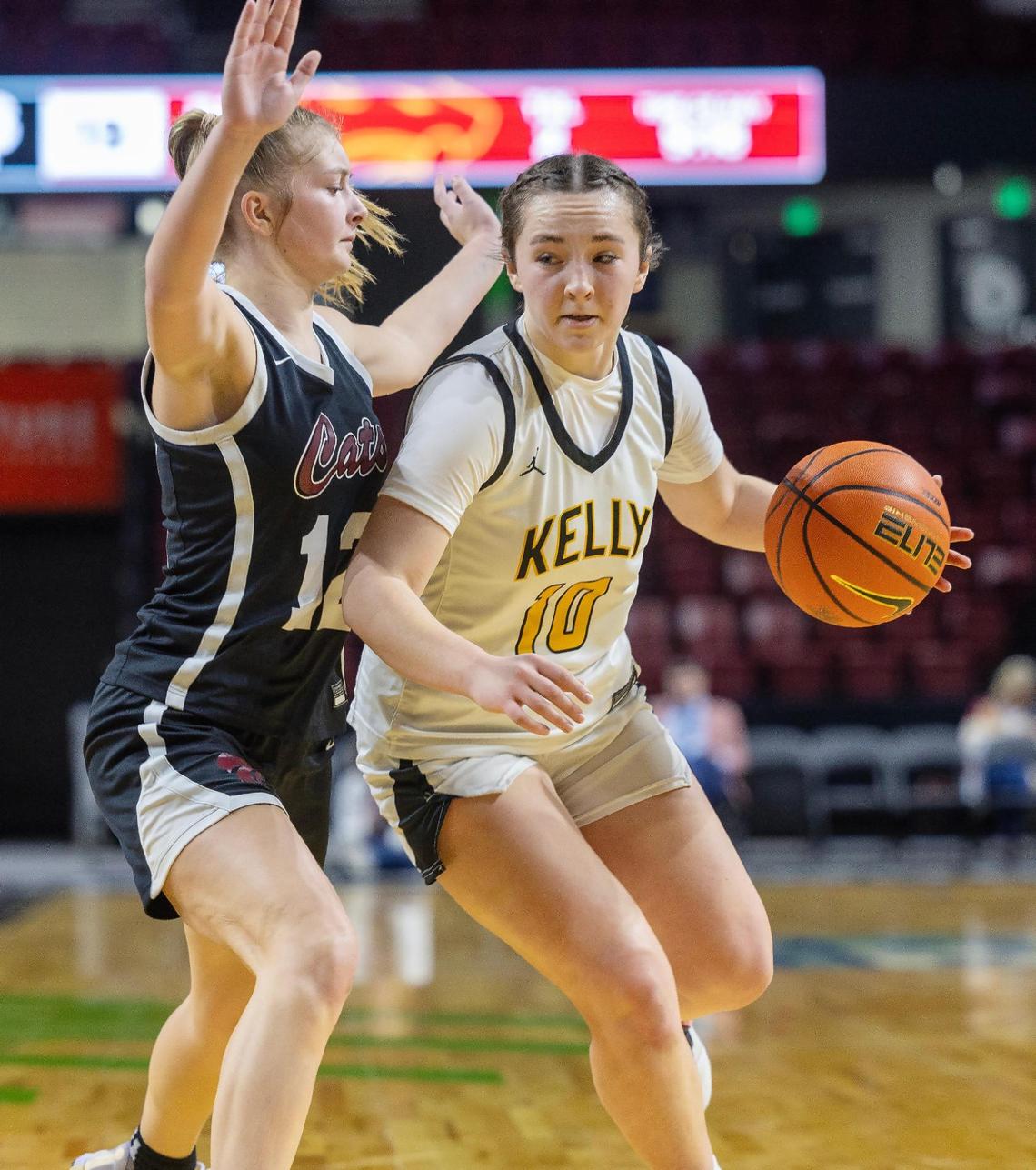 Columbia senior Jada Myers, left,guards Bishop Kelly senior junior Brooke Hutchinson during the 4A District Three Tournament championship game last week.