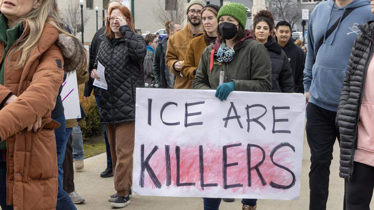 People gather outside of the Idaho Statehouse to protest against recent Immigration and Customs Enforcement (ICE) activity across the country, Friday, Jan. 30, 2026.
