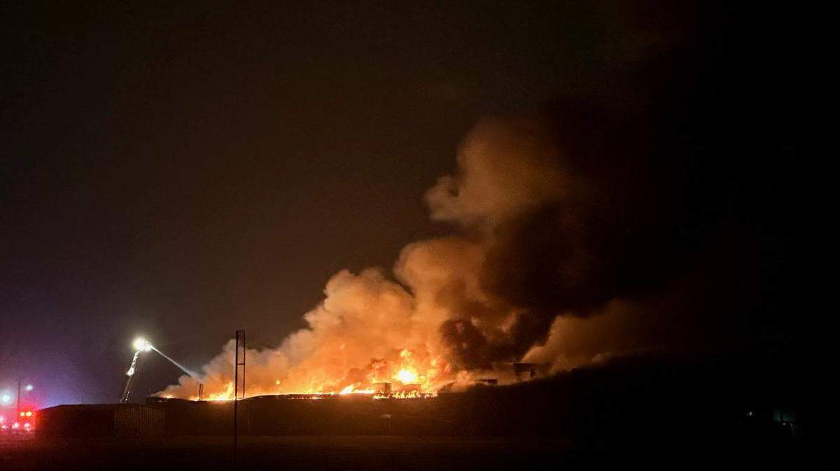 Flames and smoke shoot into the air early Friday morning from Highland High School in Pocatello.