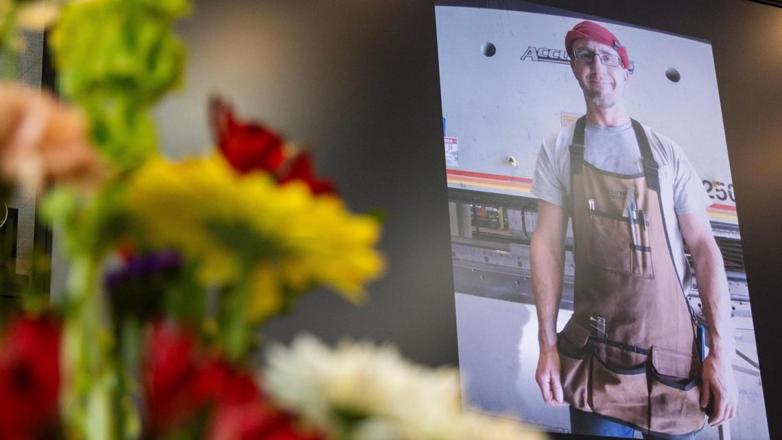 A photograph of Milo Warnock is displayed at a memorial held for him in Meridian, Jan. 13, 2024. Warnock was killed by a fellow prisoner in the Idaho State Correctional Center in December 2023.