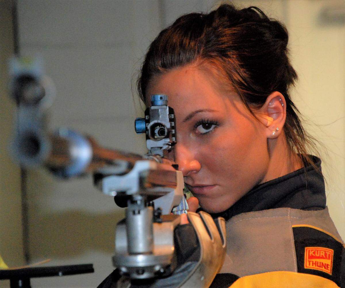 When Amanda Furrer was a Mead High School student, shown here in 2008, her father stockpiled 15,000 rounds of match-grade .22 ammo to make sure her training and Olympic shooting dreams weren’t derailed by an ammunition shortage.