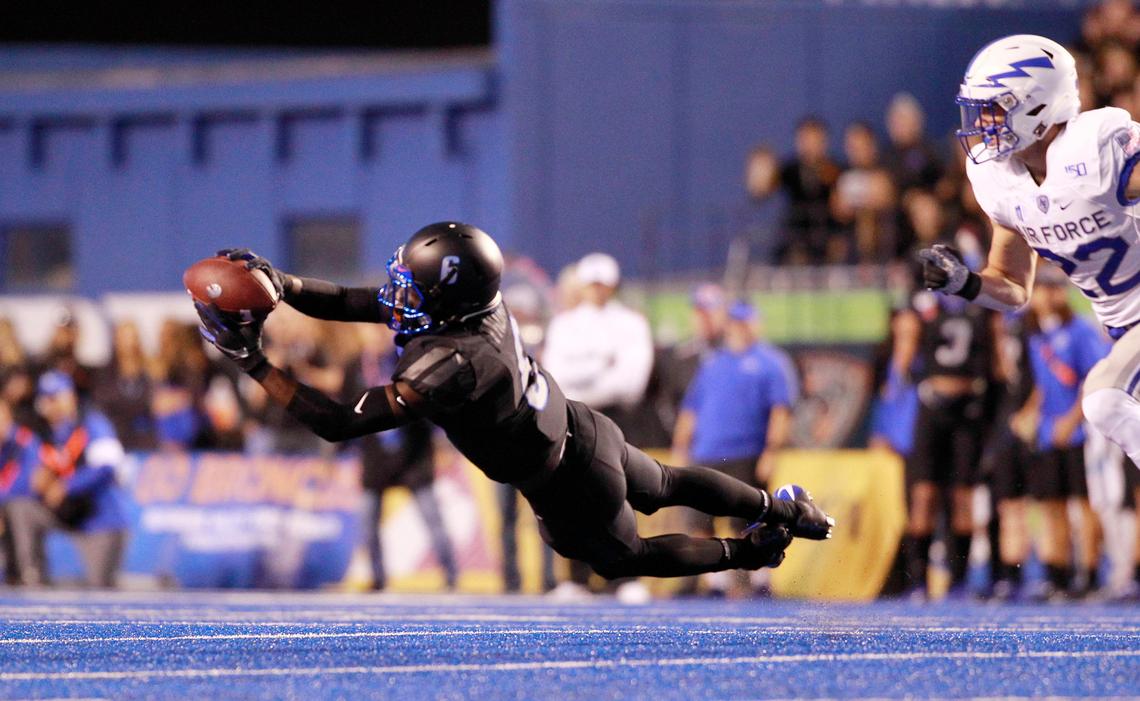 Boise State wide receiver CT Thomas (6) makes a diving catch in the first half against Air Force Academy at Albertsons Stadium on Friday Sept. 20th, 2019.