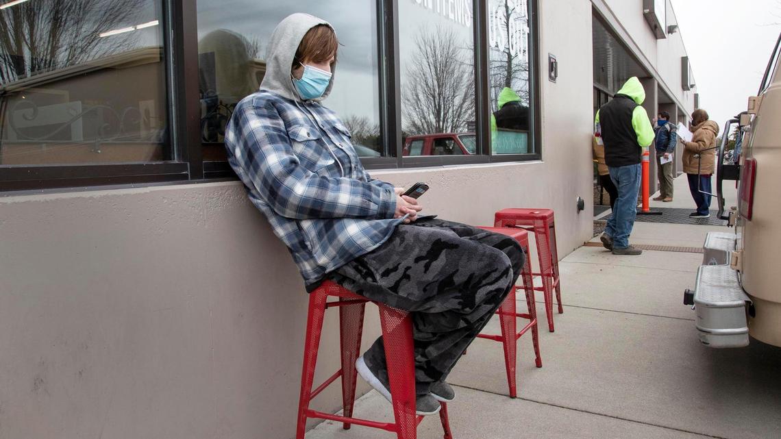 The Idaho Transportation Department assisted Canyon County when its DMV closed for two days in early November. Justin Hrabe sits outside an Ada County DMV office.
