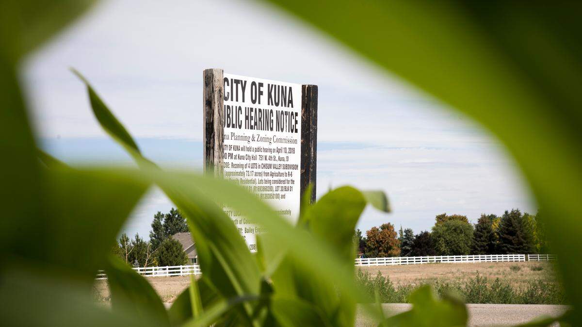 BIt by bit, agricultural land is being rezoned and developed into subdivisions. Unlike Boise, Kuna notifies the public of upcoming developments and public hearings with big signs that can be read from a car.