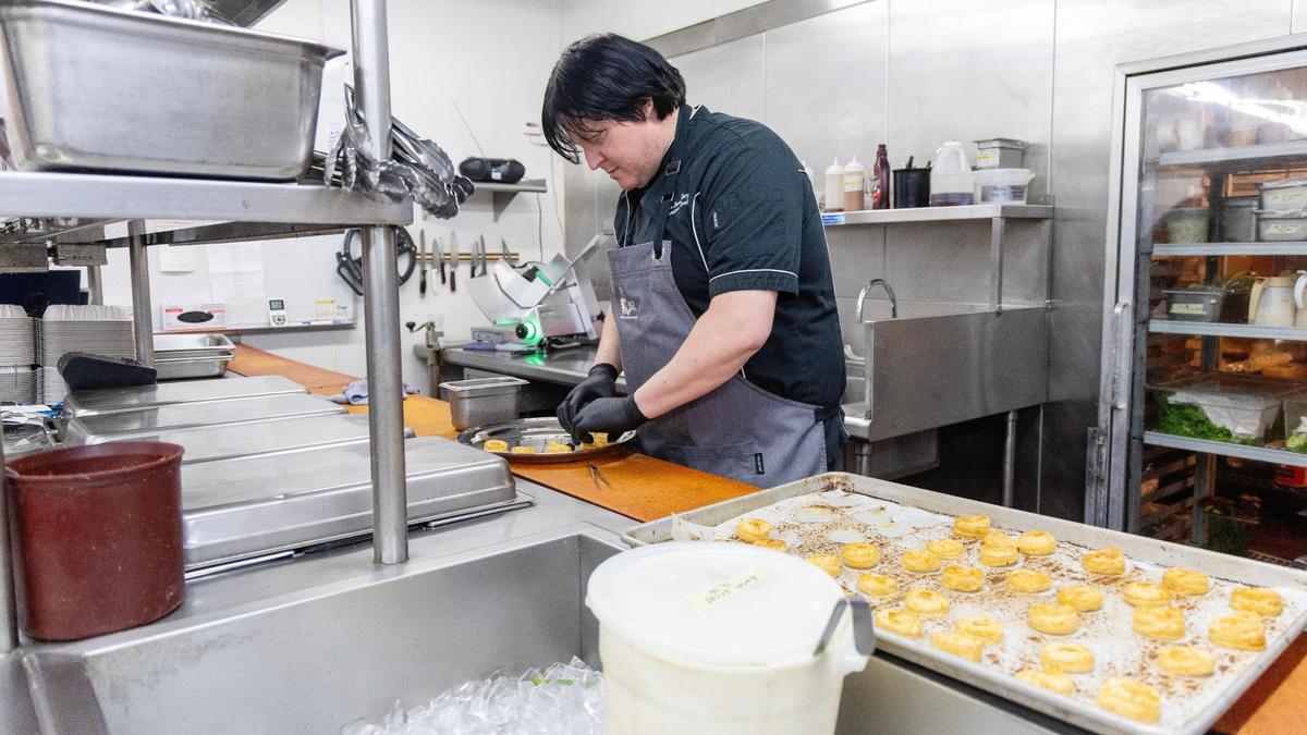 The Arid Club is known for its food and drinks as much as its social renown. Chef Dana Brenchly plates pastries. 