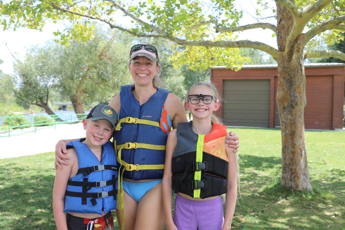 Erin Cooper said she feels safer when her children Cameron, left, and Savannah wear life jackets on the Boise River.