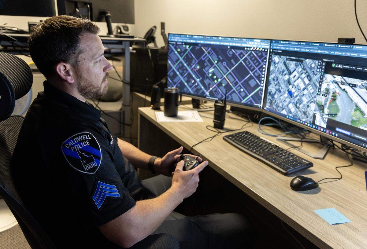 Sgt. Andrew Heitzman launches a drone from the real-time information center at Caldwell Police Department, Thursday, April 16, 2026. The department is using several different AI-based technologies to do things such as write reports, view body camera footage, read license plates and send drones as first responders to emergency calls.