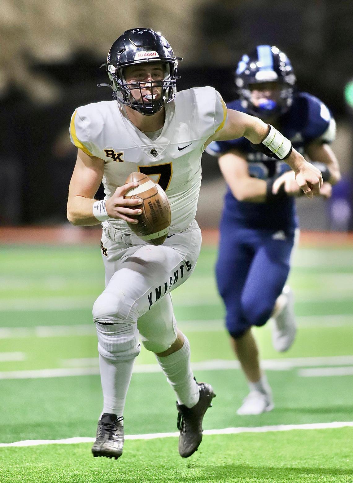 Bishop Kelley senior Hadley Smith races towards the sideline Friday during the Knights’ 50–35 loss to Skyline in the 4A state championship game in Pocatello.