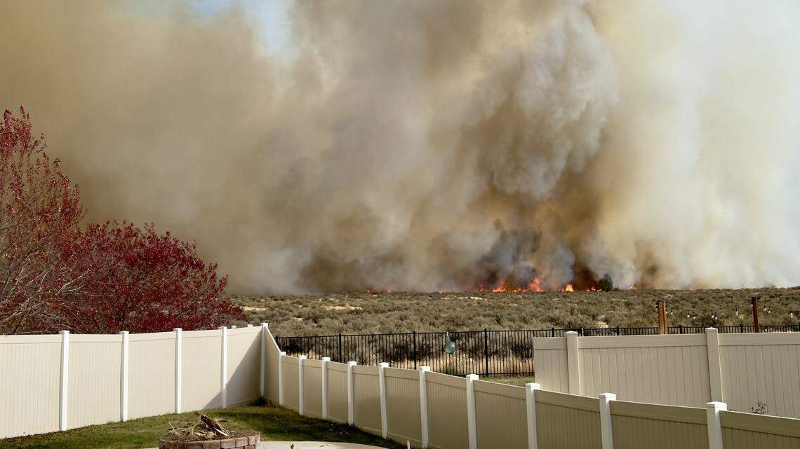 This photo from Rachaelle Larsen-Grimsrud’s backyard shows the flames near her home.