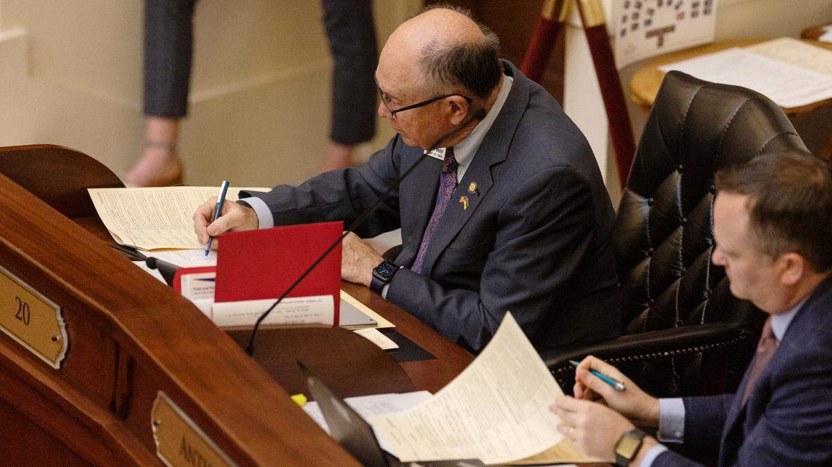 Sen. Chuck Winder, R-Boise, takes notes during a Senate session last year. He said a House proposal for the primary “doesn’t appear to be acceptable.”